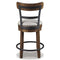 Ashley Furniture Signature Design - Valebeck Upholstered Swivel Barstool - Casual Style - Light Brown