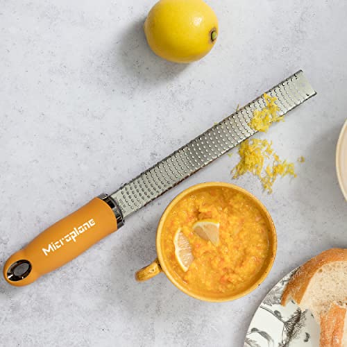 Microplane Zester Grater in Mustard Yellow for Citrus Fruits, Hard Cheese, Ginger, Chocolate and Nutmeg with Fine Stainless Steel Blade - Made in USA