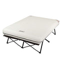 Coleman Camping Cot, Air Mattress, and Pump Combo | Folding Camp Cot and Air Bed with Side Tables and Battery Operated Pump