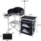 Camp Solutions Folding Cooking Table Outdoor Portable Cook Station Aluminum Camping Kitchen with Storage Organizer, Windscreen, Hooks for BBQ, Party (Black)