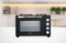 Daewoo 1500W 32L Capacity Electric Oven with 1000W and 600W Hot Plates, 90-230° Adjustable Temperature Settings and 60 Minute Timer with Indicator Light, 4SS Heating Element and Double Glass Door
