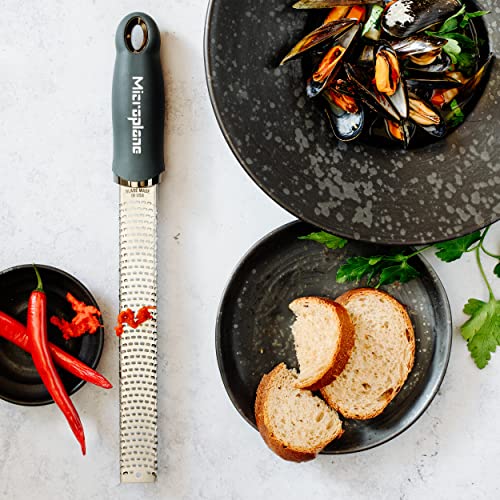 Microplane Zester Grater in After Dark Grey for Citrus Fruits, Hard Cheese, Ginger, Chocolate and Nutmeg with Fine Stainless Steel Blade - Made in USA