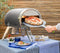 ROCCBOX Gozney Portable Outdoor Pizza Oven - Includes Professional Grade Peel, Built-In Thermometer and Safe Touch Silicone Jacket Propane Gas Fired, With Rolling Wood Flame Grey (RBX1GREYDE)