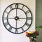 Evursua 24 inch Thicken & Heavy Large Metal Wall Clocks for Living Room Decor Large Decorative Clock Oversized,Big Roman Numeral Non Ticking (Black)