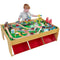 KidKraft Waterfall Mountain Wooden Train Table with Storage Boxes, Train Track Set with Wooden Toy Cars, Crane, Helicopter, Airplane and Accessories Included, Kids’ Toys, 17850