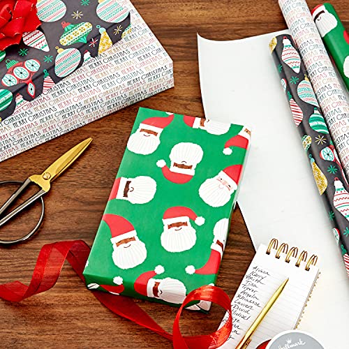 Hallmark Christmas Wrapping Paper for Kids with Cut Lines on Reverse (3 Rolls: 120 Sq. Ft. Ttl.) Multicultural Santa Claus"Merry Christmas" in Red, Green and Yellow Tri-Pack Red, Green, Yellow, Black, White 0005JXW1207