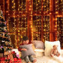 Jingle Jollys 6X3M Christmas Curtain Lights 600LED Warm White - Coll Online